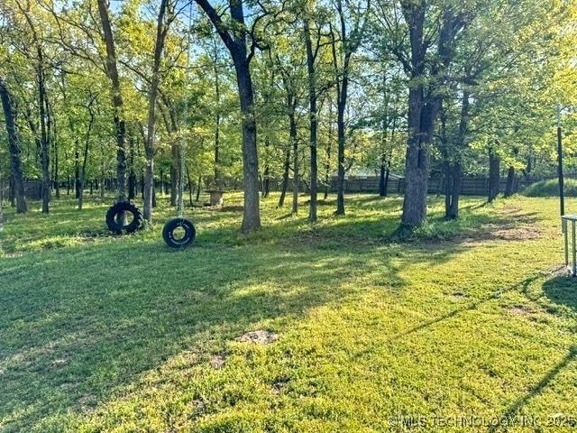 view of yard featuring fence