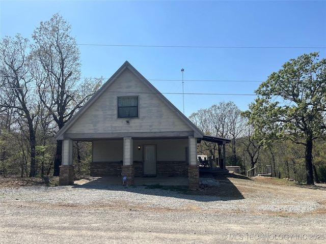 216 N Bk 1600 Rd, Stigler, OK 74462 - view of front of house with a porch
