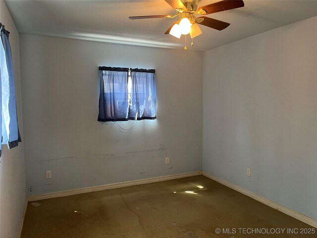 216 N Bk 1600 Rd, Stigler, OK 74462 - unfurnished room featuring baseboards, ceiling fan, and unfinished concrete floors