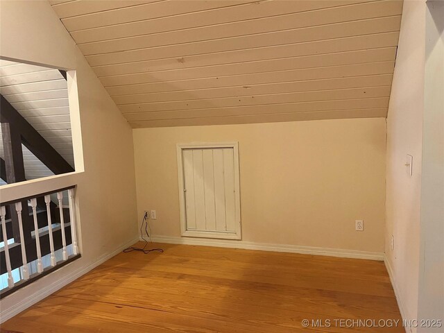 216 N Bk 1600 Rd, Stigler, OK 74462 - additional living space featuring light wood-style floors, wooden ceiling, baseboards, and vaulted ceiling