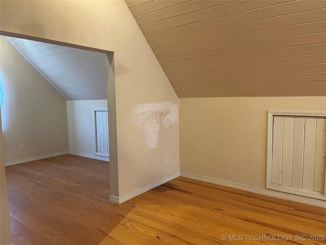 216 N Bk 1600 Rd, Stigler, OK 74462 - bonus room with baseboards, vaulted ceiling, and light wood-style floors