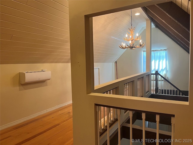 216 N Bk 1600 Rd, Stigler, OK 74462 - stairway featuring a chandelier, baseboards, vaulted ceiling, and wood finished floors