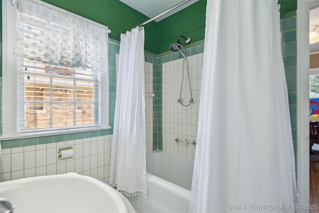 full bathroom with shower / bath combination with curtain