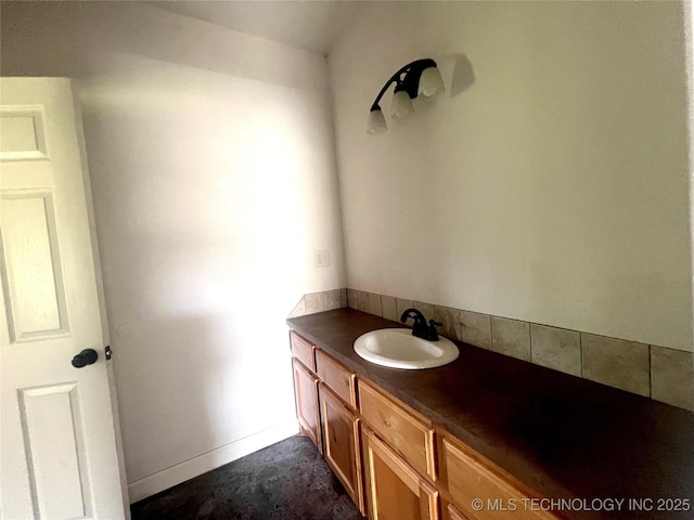 220 Willow Ln, Hartshorne, OK 74547 - bathroom with backsplash, baseboards, and vanity