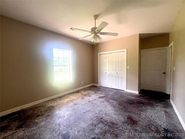 220 Willow Ln, Hartshorne, OK 74547 - unfurnished bedroom with a closet, baseboards, and a ceiling fan