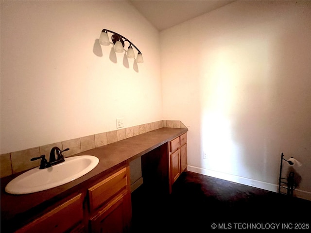 220 Willow Ln, Hartshorne, OK 74547 - bathroom featuring a sink, concrete flooring, and baseboards