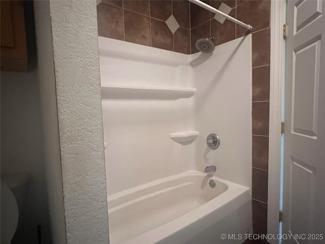 220 Willow Ln, Hartshorne, OK 74547 - bathroom with shower / bath combination, toilet, and a textured wall