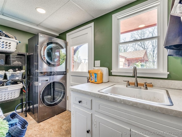 614 Oak Ridge Dr, Sand Springs, OK 74063 - washroom with estacked washer and dryer