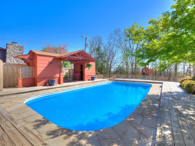 614 Oak Ridge Dr, Sand Springs, OK 74063 - view of pool with a deck and an outbuilding