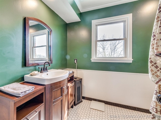 614 Oak Ridge Dr, Sand Springs, OK 74063 - full bathroom featuring vanity, healthy amount of natural light, and ornamental molding