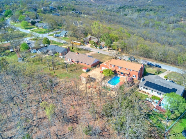 614 Oak Ridge Dr, Sand Springs, OK 74063 - aerial view of property and surrounding area with a pool and a forest