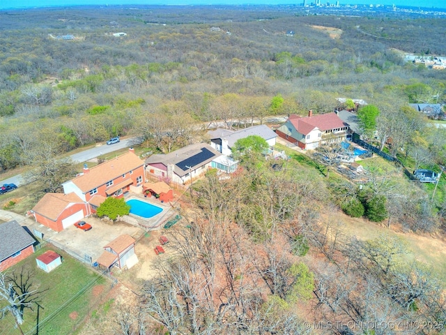 614 Oak Ridge Dr, Sand Springs, OK 74063 - aerial view of a forest and a pool
