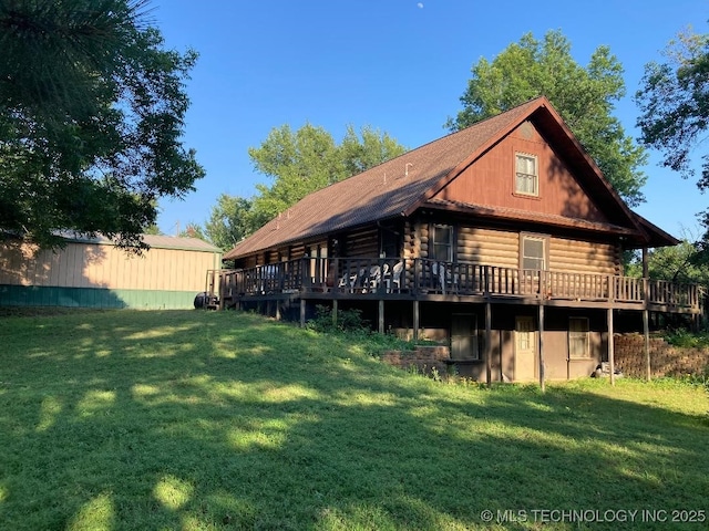 17735 S 75th St E, Warner, OK 74469 - rear view of house with a lawn, log exterior, and a deck