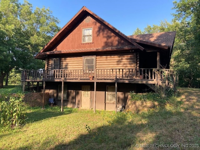 17735 S 75th St E, Warner, OK 74469 - back of house with a yard, log exterior, and a deck