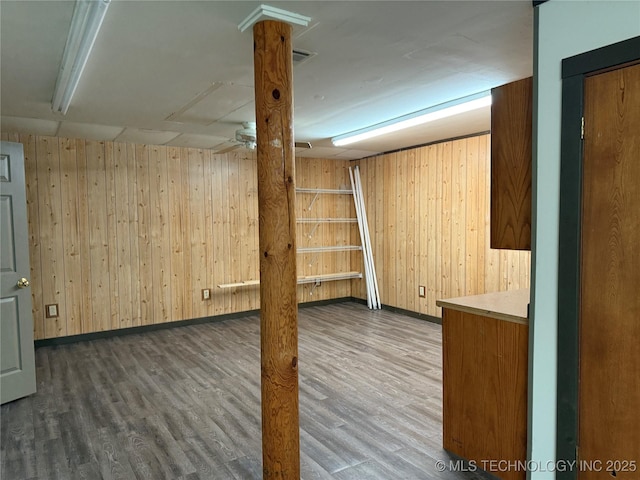 17735 S 75th St E, Warner, OK 74469 - finished below grade area featuring wood walls, wood finished floors, and baseboards