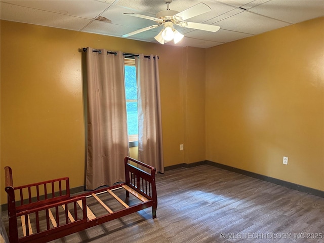 17735 S 75th St E, Warner, OK 74469 - bedroom with ceiling fan, baseboards, and wood finished floors