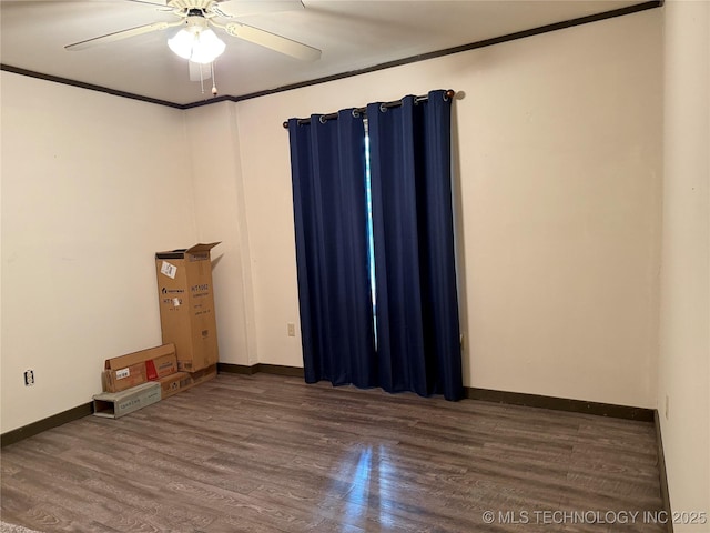 17735 S 75th St E, Warner, OK 74469 - unfurnished room with crown molding, baseboards, a ceiling fan, and wood finished floors