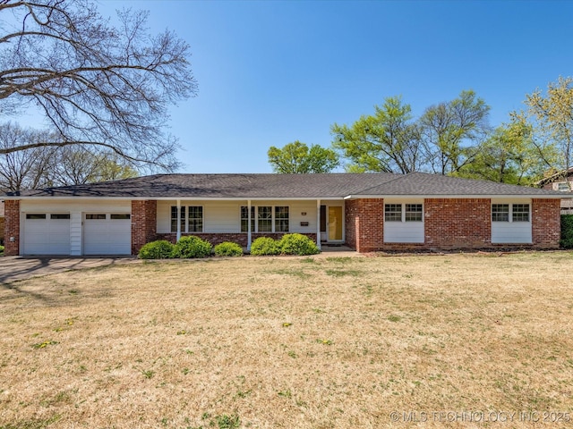 ranch-style home featuring an attached garage, driveway, a front yard, and brick siding