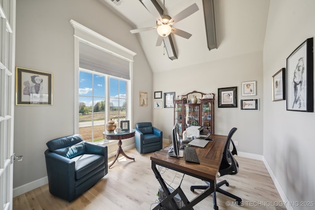 home office with light wood-style floors, baseboards, a ceiling fan, and lofted ceiling