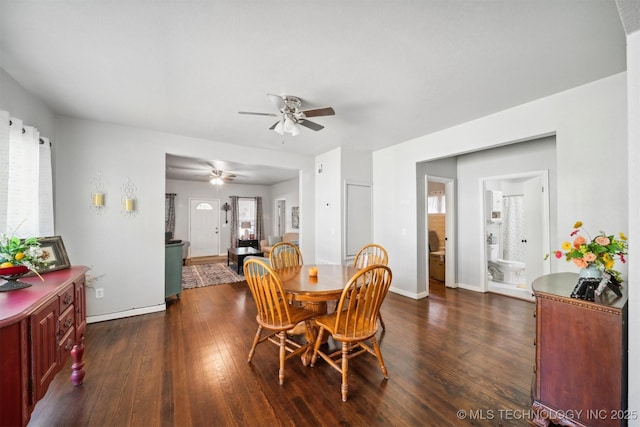 dining area with hardwood / wood-style flooring, baseboards, and ceiling fan