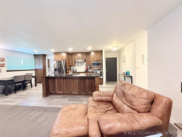 living room featuring recessed lighting and light colored carpet