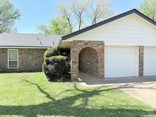 view of front facade featuring a shingled roof, a garage, a front lawn, and brick siding