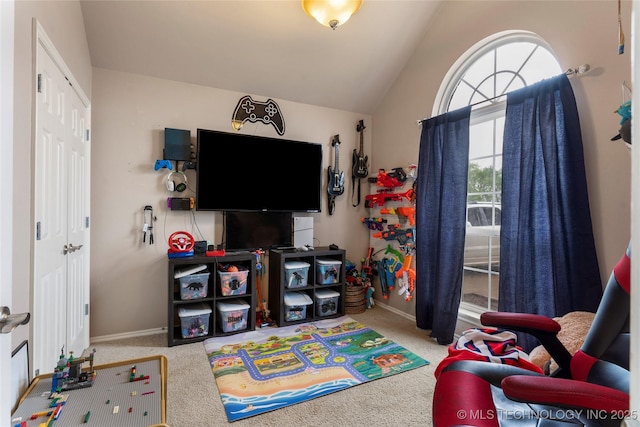 playroom with carpet flooring, baseboards, and lofted ceiling