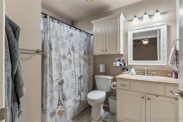 full bath with toilet, curtained shower, vanity, and tile patterned flooring