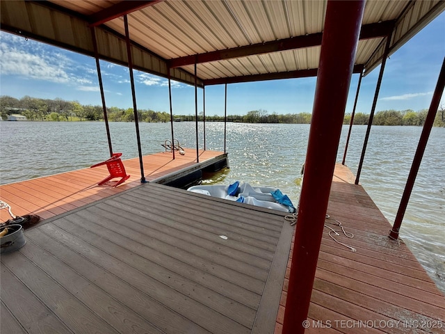 view of dock with a water view