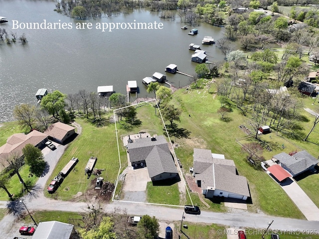 aerial view with a water view and a residential view