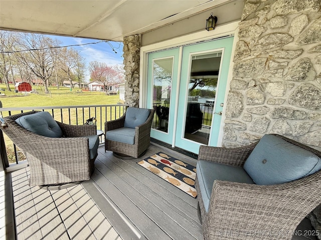 deck featuring a lawn