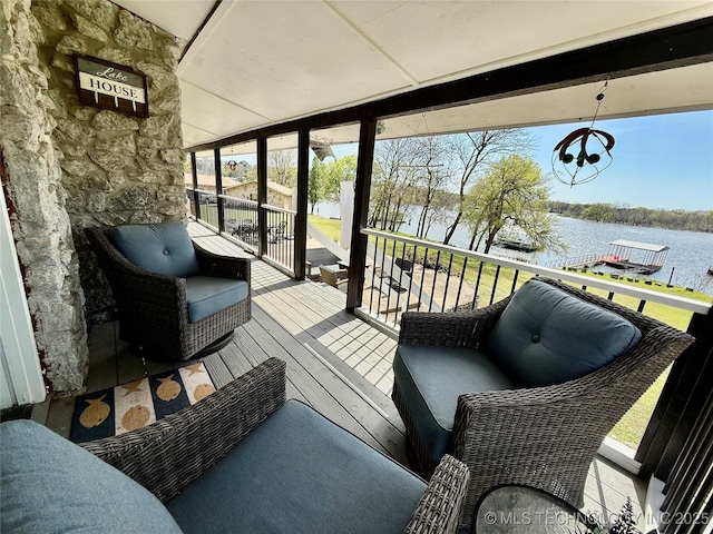 balcony featuring a water view