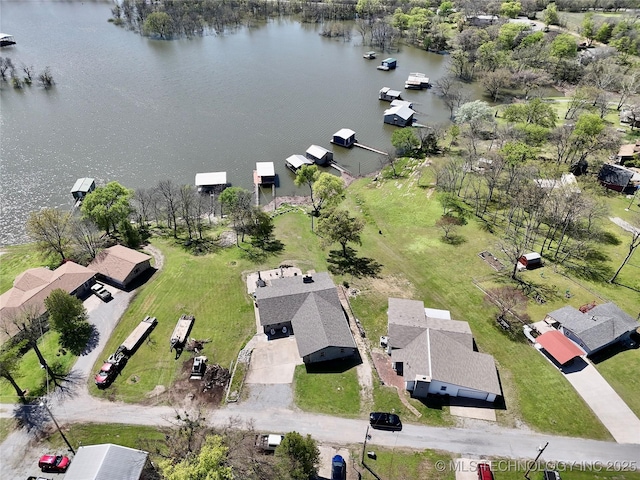 bird's eye view with a water view and a residential view