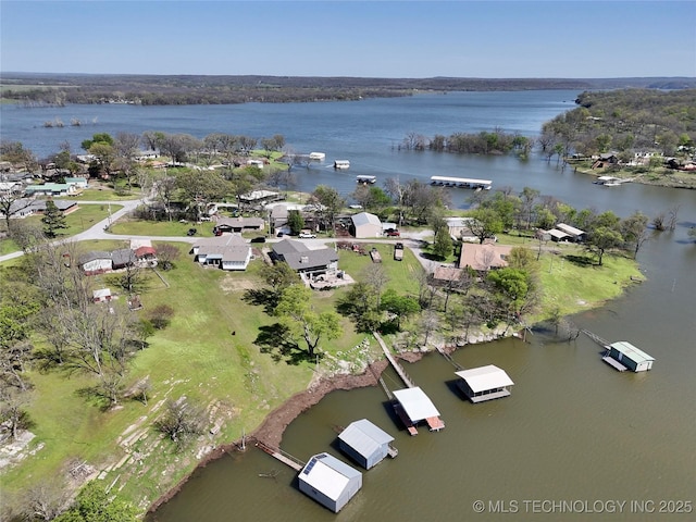 drone / aerial view with a water view