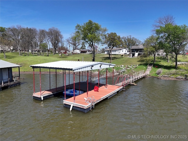 dock area featuring a water view and a yard