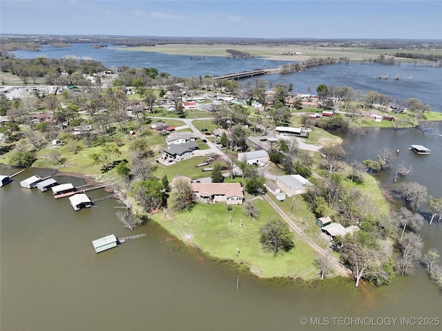 bird's eye view featuring a residential view and a water view