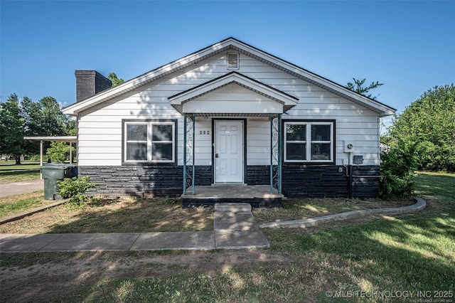 804 S Sooner Rd, Midwest City, OK 73110 - bungalow-style home with a chimney and stone siding