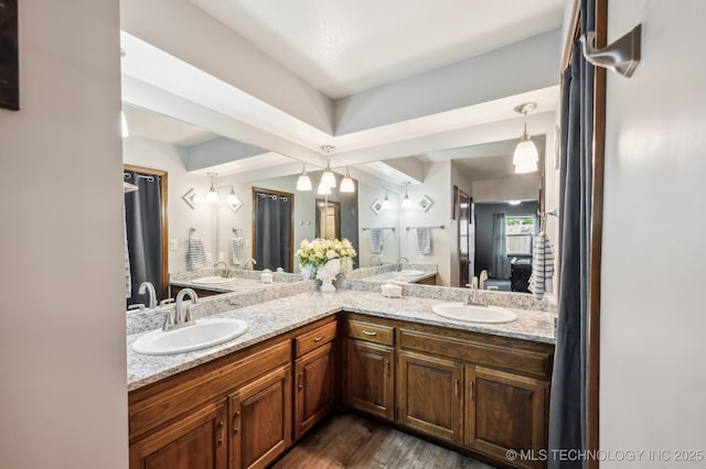 1604 S Chestnut Ave, Broken Arrow, OK 74012 - full bathroom featuring connected bathroom, double vanity, and wood finished floors