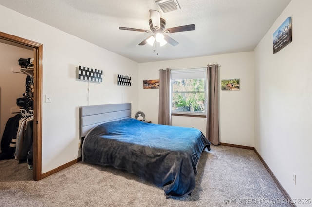 1604 S Chestnut Ave, Broken Arrow, OK 74012 - bedroom with a spacious closet, carpet, a ceiling fan, and a closet