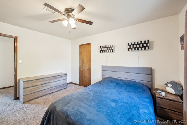1604 S Chestnut Ave, Broken Arrow, OK 74012 - carpeted bedroom featuring baseboards and ceiling fan