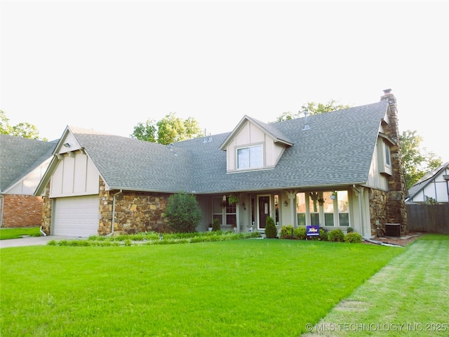 1604 S Chestnut Ave, Broken Arrow, OK 74012 - view of front of property with stone siding, roof with shingles, a chimney, and a front yard