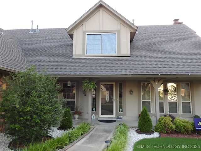 1604 S Chestnut Ave, Broken Arrow, OK 74012 - view of front of home with a shingled roof, stucco siding, and covered porch
