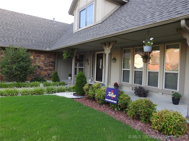 1604 S Chestnut Ave, Broken Arrow, OK 74012 - property entrance with roof with shingles and a yard
