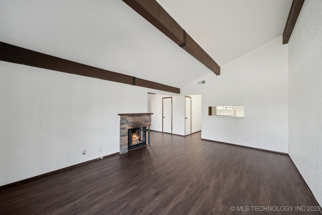 11024 E 15th St, Tulsa, OK 74128 - unfurnished living room with beamed ceiling, wood finished floors, a warm lit fireplace, high vaulted ceiling, and baseboards