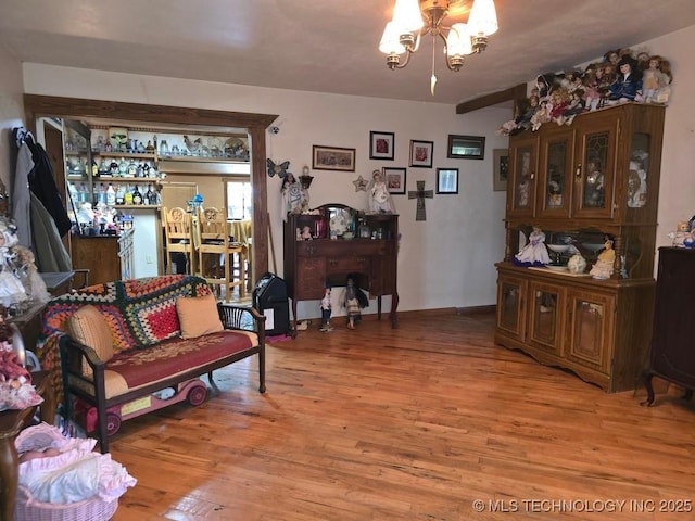 6750 Meridian Rd, Ardmore, OK 73401 - living area featuring a chandelier and light wood finished floors