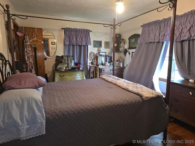 6750 Meridian Rd, Ardmore, OK 73401 - bedroom with wood finished floors