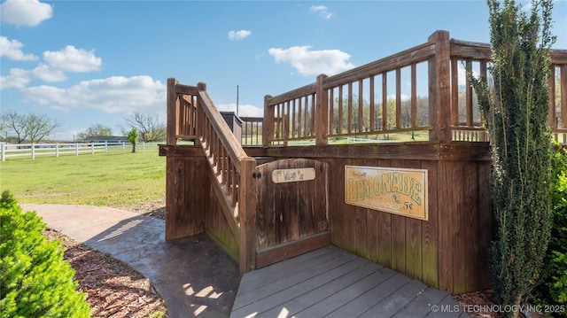 wooden deck with a yard