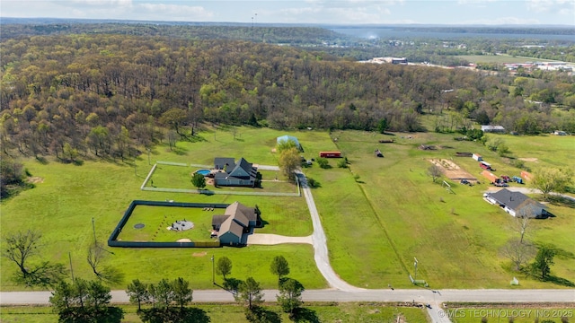 aerial view with a rural view and a forest view
