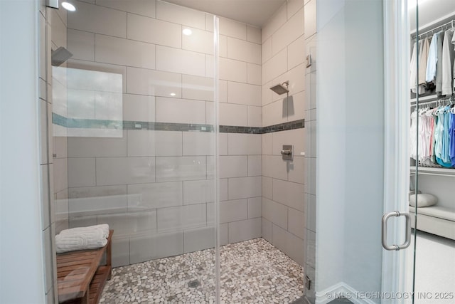 5716 W Austin St, Broken Arrow, OK 74011 - full bathroom featuring a stall shower and a spacious closet