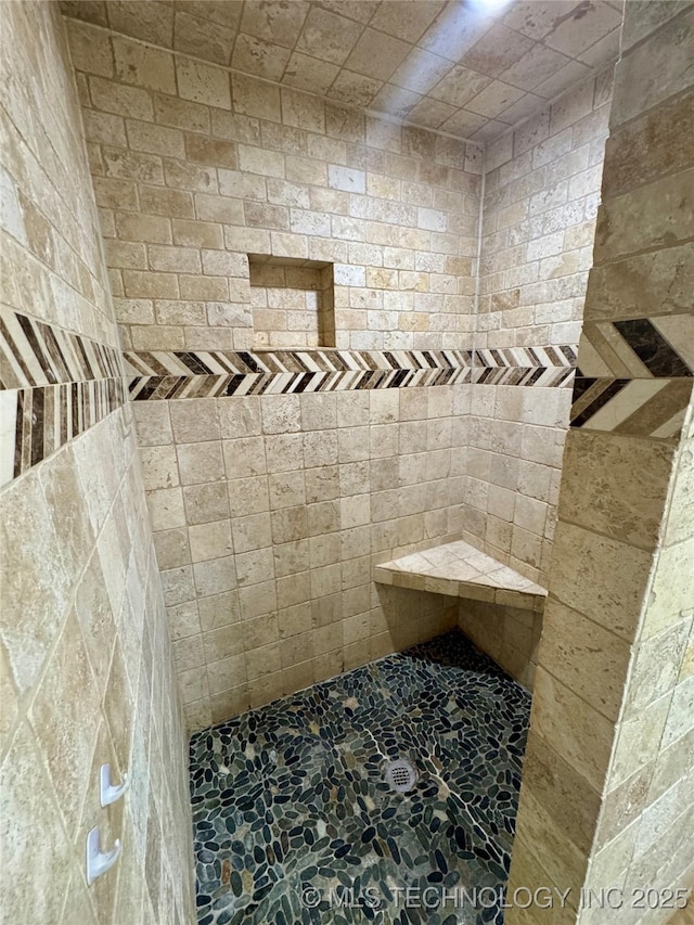 5101 S Spruce Dr, Sand Springs, OK 74063 - full bathroom with stone finish flooring and tiled shower